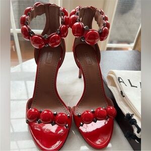 Alaïa's La Bombe 90 studded patent-leather sandals - Size 39